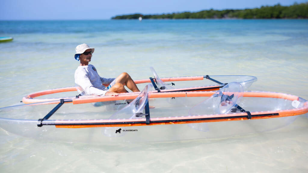 Gorilla Boats tour guide John Martin prepares for a mangrove excursion tour at Sombrero Beach.