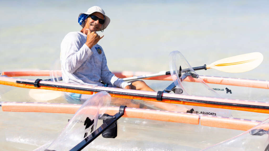 John Martin, expert tour guide of Gorilla Boats, aboard a clear kayak at Sombrero Beach, Marathon, FL.